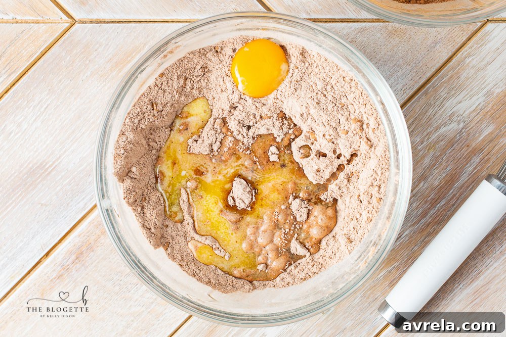 Mixing the dry ingredients for Hot Fudge Pudding Cake in a bowl