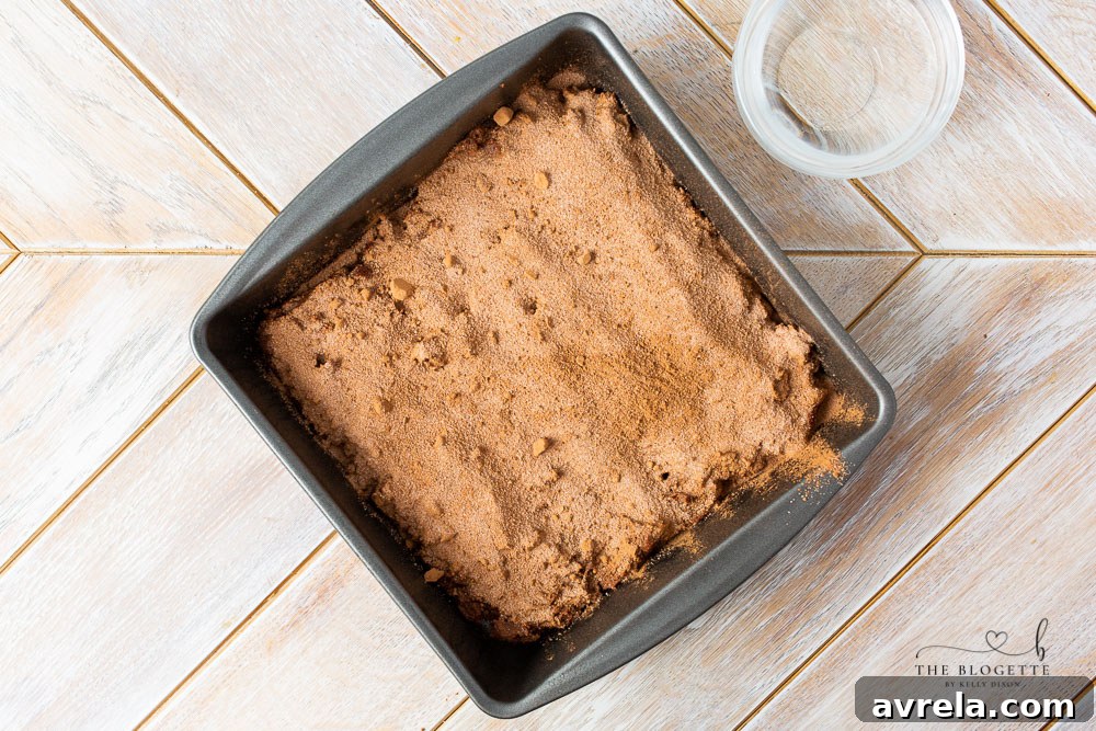 Hot Fudge Pudding Cake batter with dry topping sprinkled on top, ready for boiling water