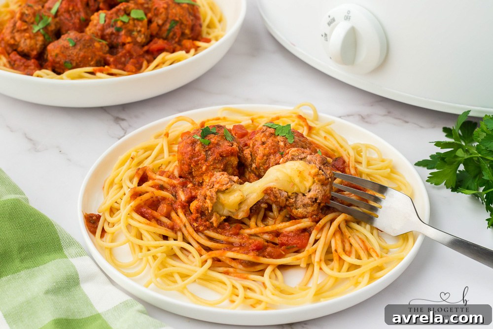 Slow Cooker Cheesy Stuffed Meatball Magic 11 Crock Pot Stuffed Meatballs in a bowl