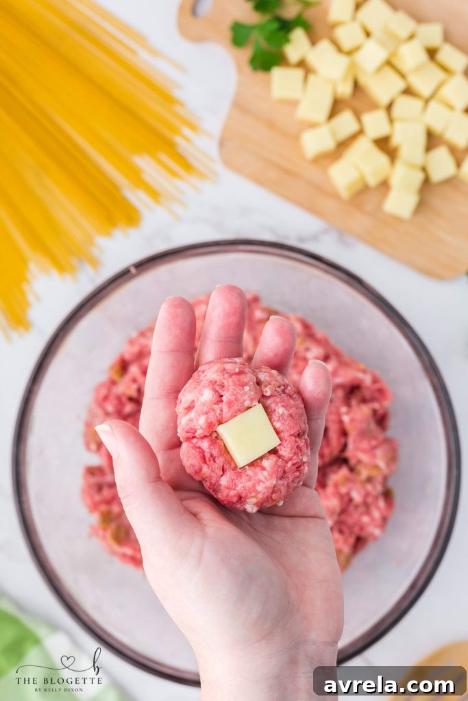 Slow Cooker Cheesy Stuffed Meatball Magic 9 Mozzarella Stuffed Meatballs ready for cooking