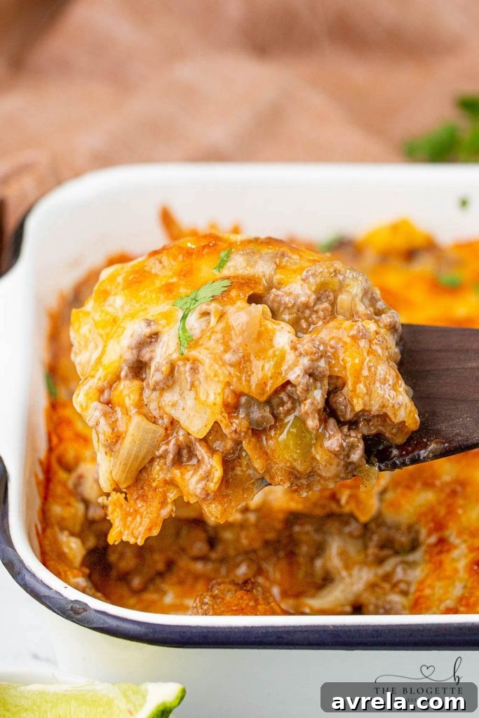 Ultimate Taco Bake 2 Delicious Taco Casserole with melted cheese, a perfect easy family dinner