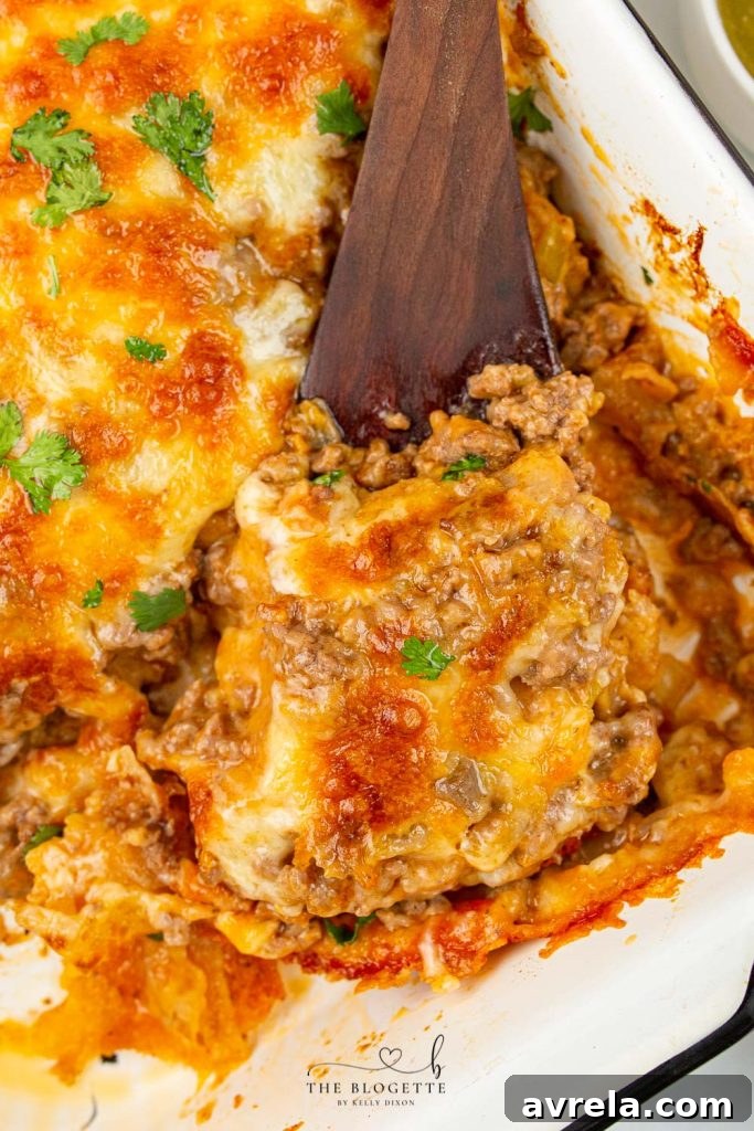 Ultimate Taco Bake 3 Close-up of a Taco Casserole with layers of seasoned beef and melted cheese
