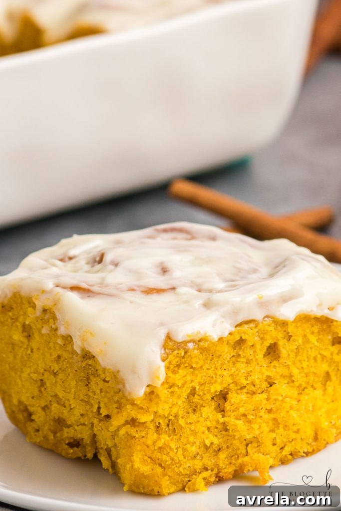 Fall Pumpkin Spice Swirls 3 Fluffy Pumpkin Cinnamon Rolls topped with an addicting homemade glaze and filled with a buttery pumpkin spice sugar blend.