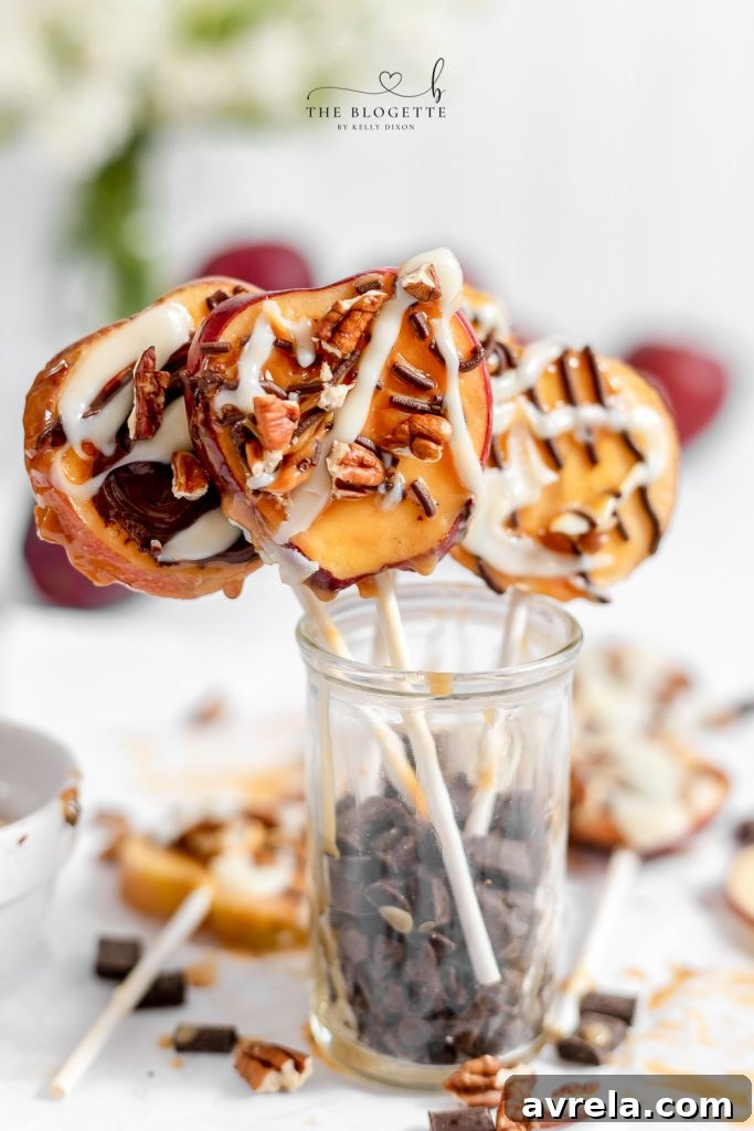 Easy Caramel Apple Slices! Make this fall apple treat with all of your favorite toppings!