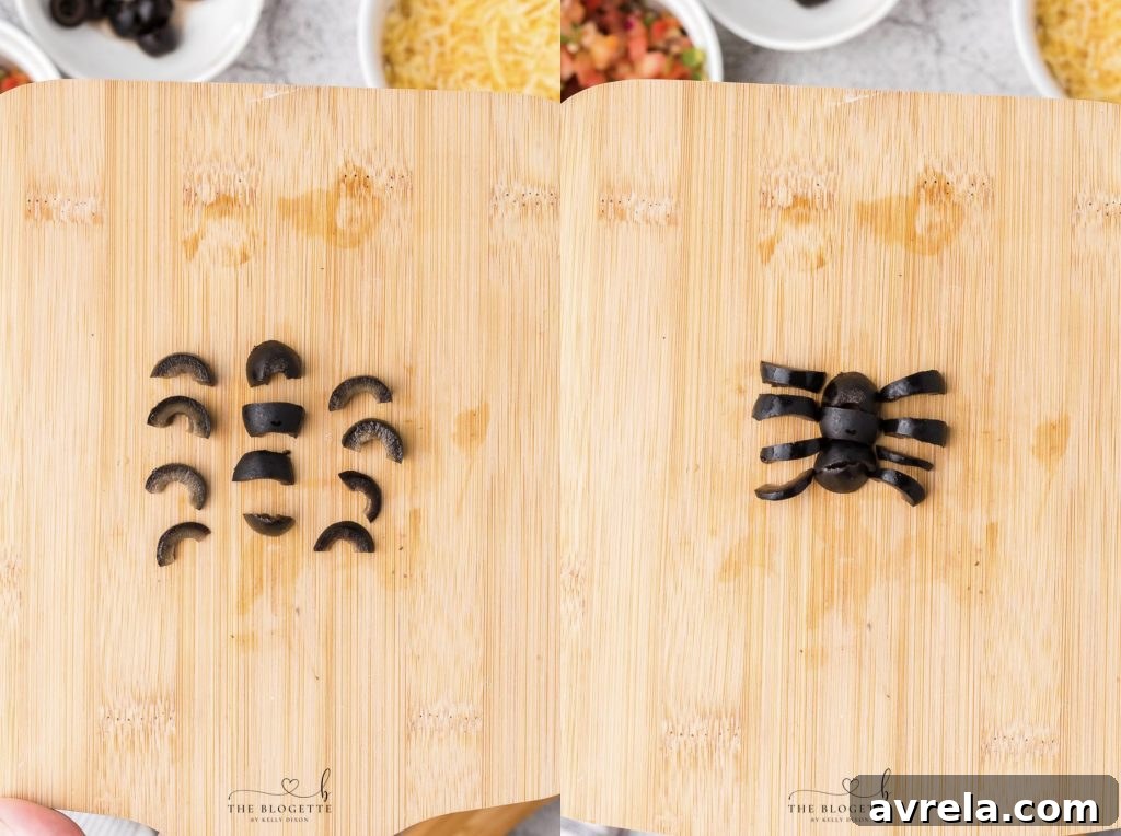 A spooky olive spider decoration with eight legs on a creamy dip.