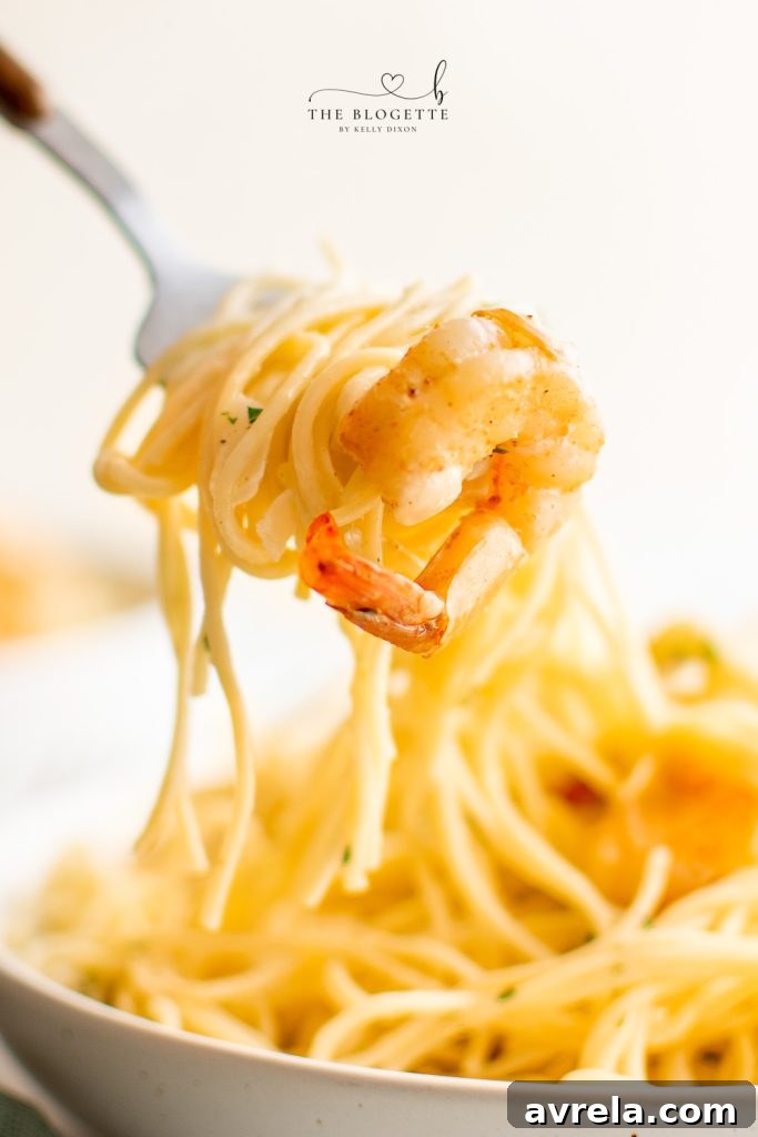 Lemon Garlic Butter Scampi Pasta 9 A beautifully presented plate of Garlic Butter Shrimp Scampi Pasta, ready to be served.