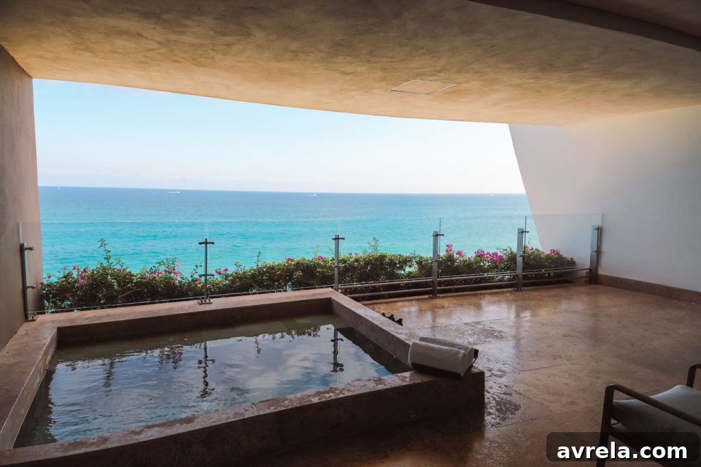 Grand Velas Los Cabos suite balcony with ocean view, showcasing luxury accommodation.