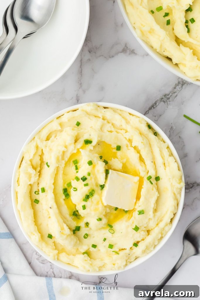 Cream Cheese Mashed Potatoes - Thick and creamy homemade mashed potatoes. Great as a side dish and an absolute staple recipe for the holidays!