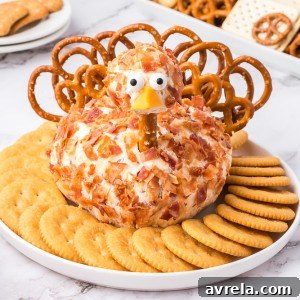 This Bacon Ranch Turkey Cheeseball will be a hit at the holiday table! This is a Thanksgiving appetizer you MUST add to your menu!