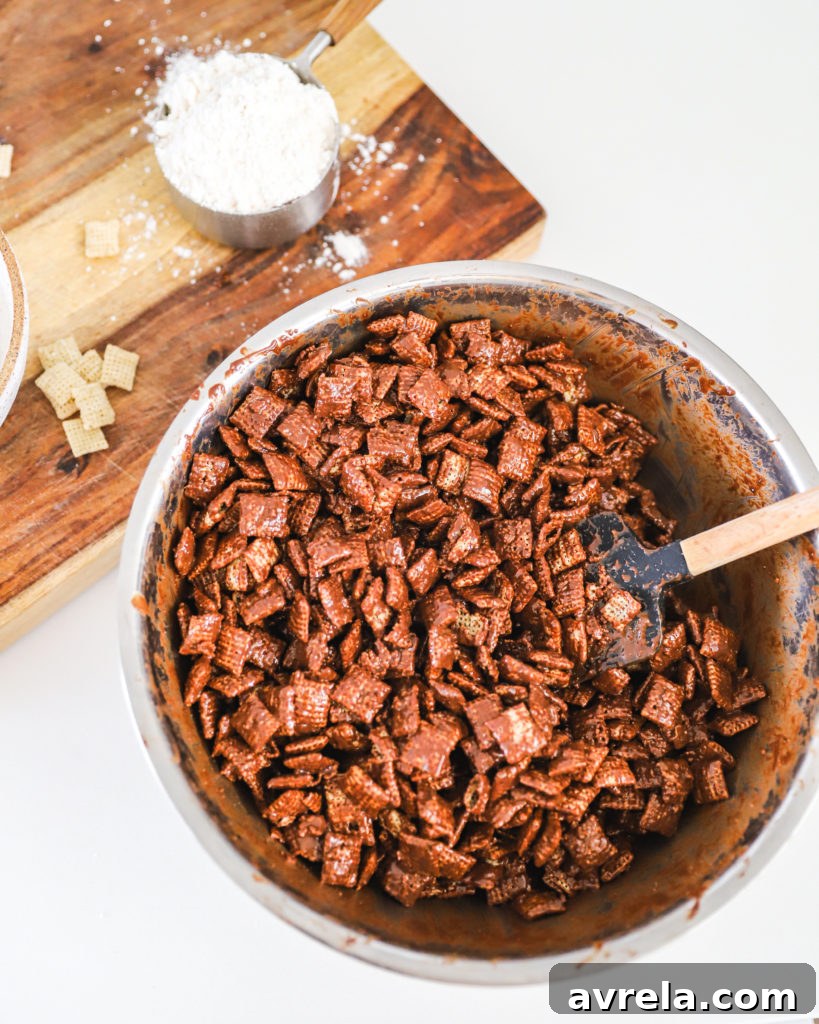 Another perspective of Muddy Buddies in a festive bowl, ready for serving.