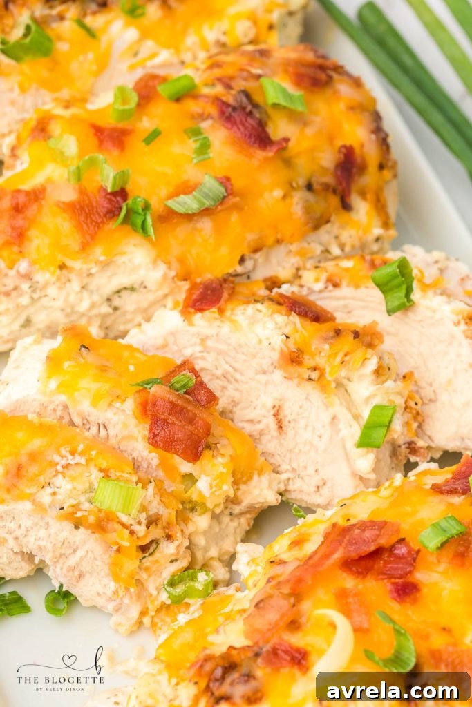 A glorious shot of Million Dollar Chicken, perfectly baked and garnished.