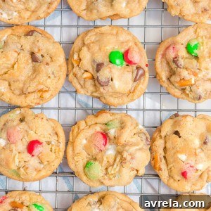 Kitchen Sink Christmas Cookies are sweet-and-salty, chewy-and-gooey cookies with M&M's, chocolate chips, pretzels, marshmallows, potato chips... everything but the kitchen sink!