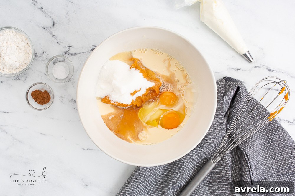 A collection of pumpkin pie ingredients laid out on a rustic surface, ready for baking.