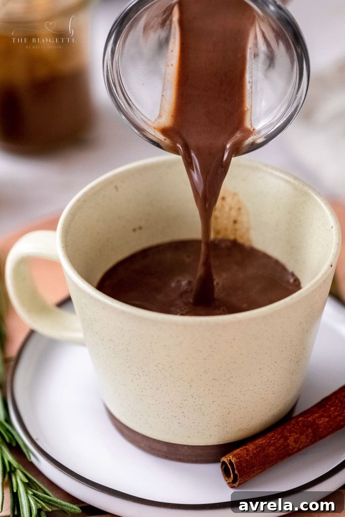 Gingerbread Hot Chocolate is Christmas in a cup! It's like drinking a chocolate gingerbread cookie!