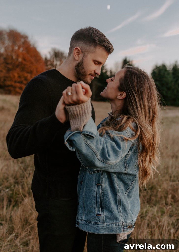 The happy couple embracing, showcasing their deep connection and joy in an outdoor scenic setting.