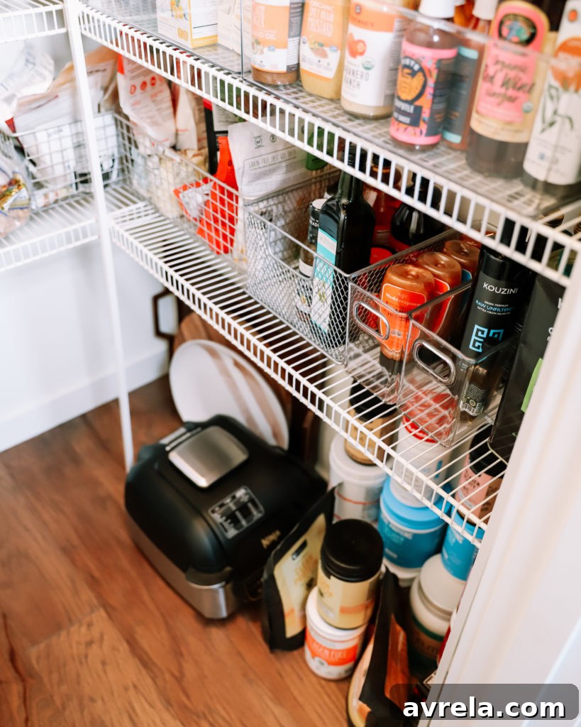 Kitchen Mastery The Art of Effortless Organization 3 Organized pantry interior with bins and jars