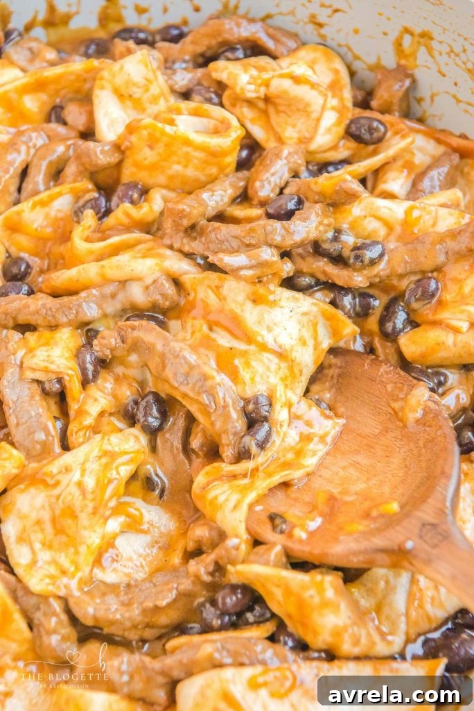 This 15-minute Burrito Skillet has sirloin steak, black beans, a creamy sauce, and tortillas all cooked in one skillet.
