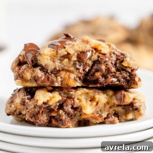 The BEST CHOCOLATE CHIP COOKIES recipe ever! These bakery-style cookies are warm, soft, and thick.