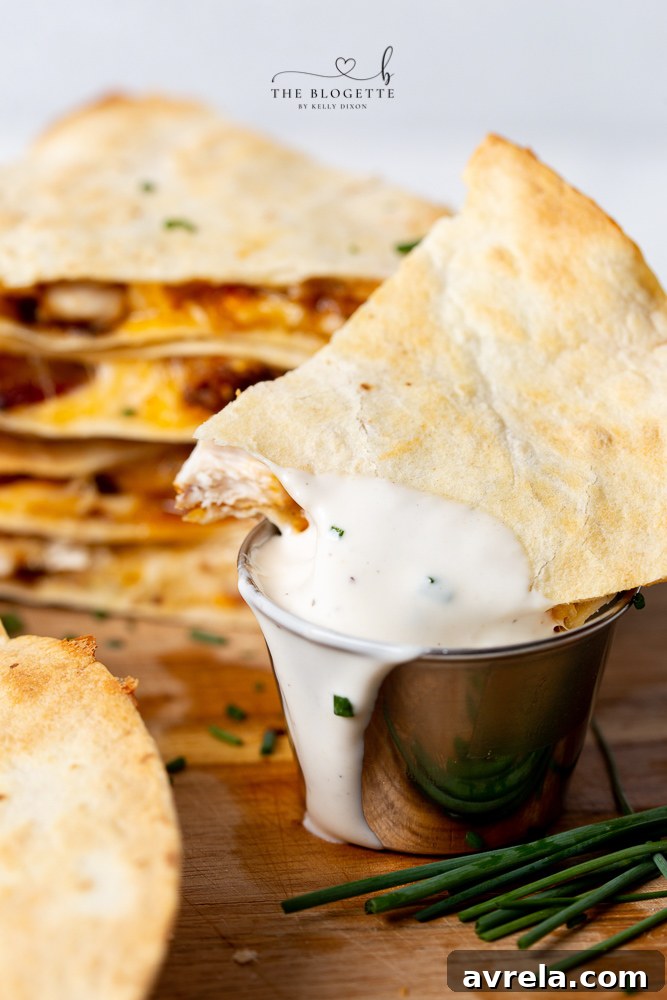 Close-up of a golden brown Buffalo Chicken Bacon Quesadilla