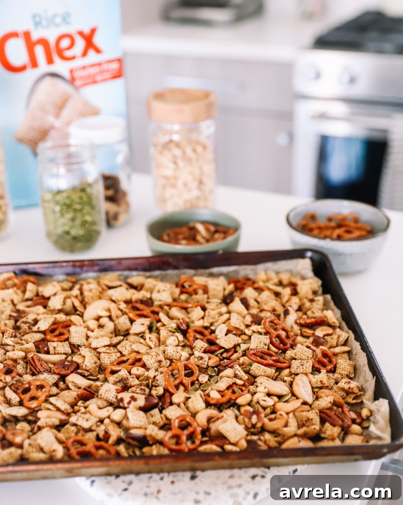 Mixing Chex Mix ingredients in a bowl