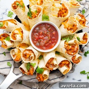 A Blooming Burrito Ring is the perfect appetizer for any occasion! A round display of chicken and bean burritos served with a bowl of dip.