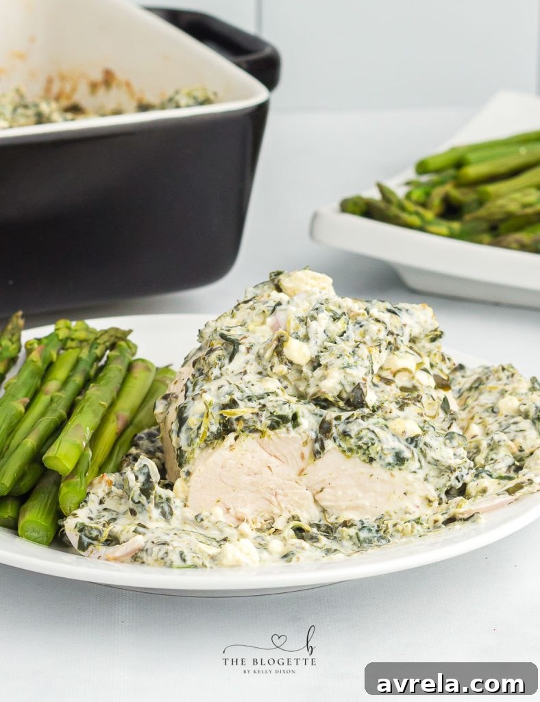 Creamy Spinach Chicken Bake 8 Close-up of Spinach Dip Chicken Bake in a baking dish