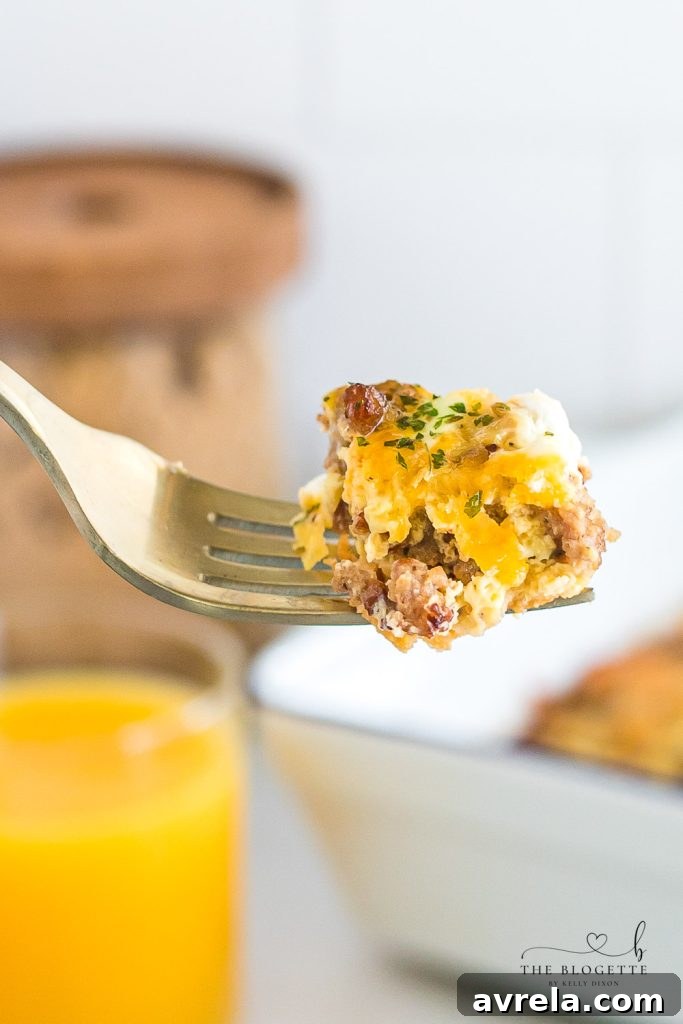 The best Breakfast Sausage Casserole with a layer of cheese, eggs, crescent dough, and sausage!