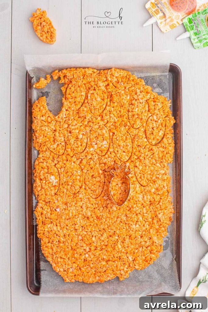 Mixing Rice Krispies cereal into melted marshmallows