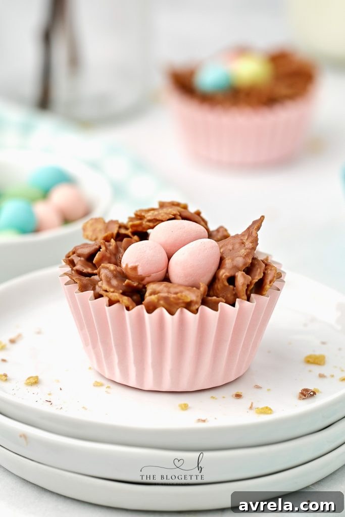 Final presentation of perfectly set Chocolate Egg Nests, filled with colorful mini eggs, ready for an Easter celebration.