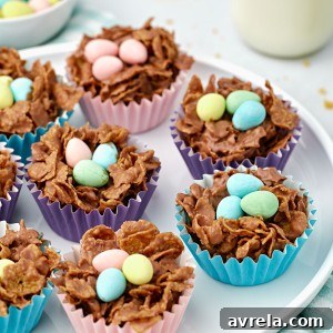 Chocolate Egg Nests made with cornflakes are the perfect Easter treat! This an easy, no-bake Easter dessert idea that kids can help make.