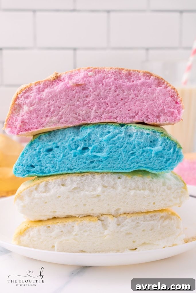 Soft and fluffy cloud bread is easy to make and tastes almost like cotton candy! It is fun to rip open, revealing the colorful bread inside.