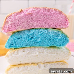 Soft and fluffy cloud bread is easy to make and tastes almost like cotton candy! It is fun to rip open, revealing the colorful bread inside.