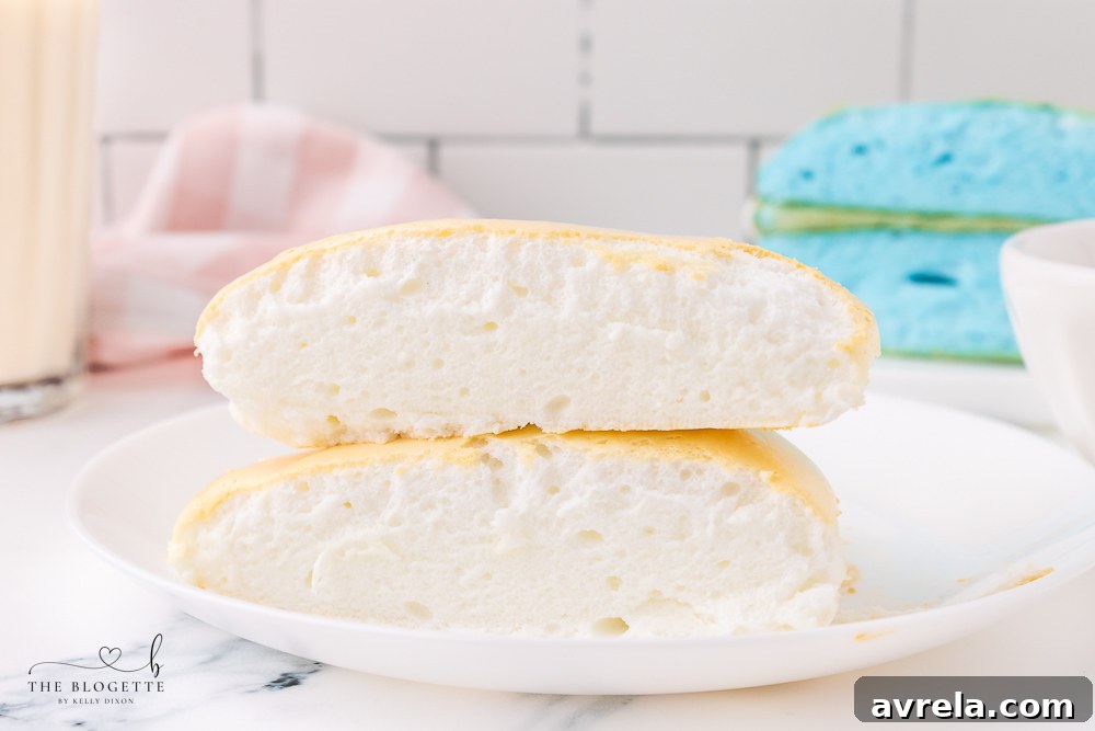 Soft and fluffy cloud bread is easy to make and tastes almost like cotton candy! It is fun to rip open, revealing the colorful bread inside.
