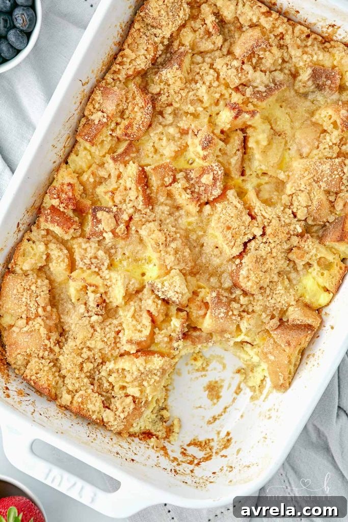 Morning Glory French Toast Bake 3 A close-up of the delicious Overnight French Toast Casserole, showcasing its crispy brown sugar topping and soft interior.
