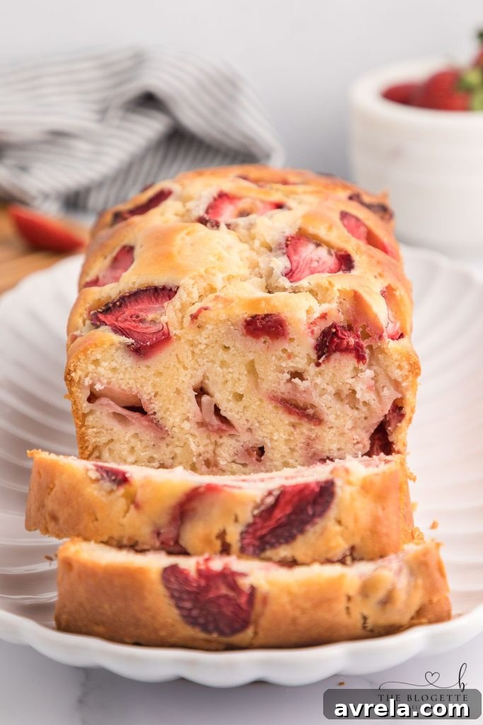 Sweet and soft Strawberry Bread, a delightful spring and summer quick bread made with fresh strawberries.