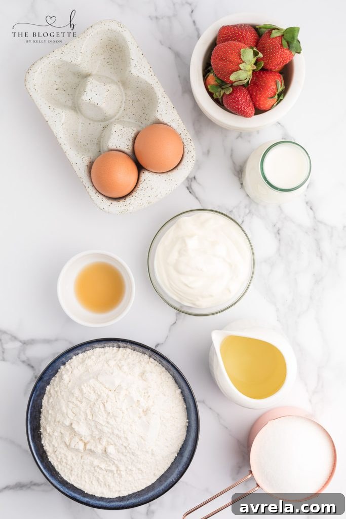 Ingredients laid out for preparing homemade Strawberry Bread.