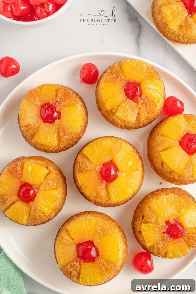 Caramelized Pineapple Delights 2 Easy Pineapple Upside Down Cupcakes Recipe! Soft, buttery sweet cupcakes with a moist top, tender pineapple pieces, and cherry on top.
