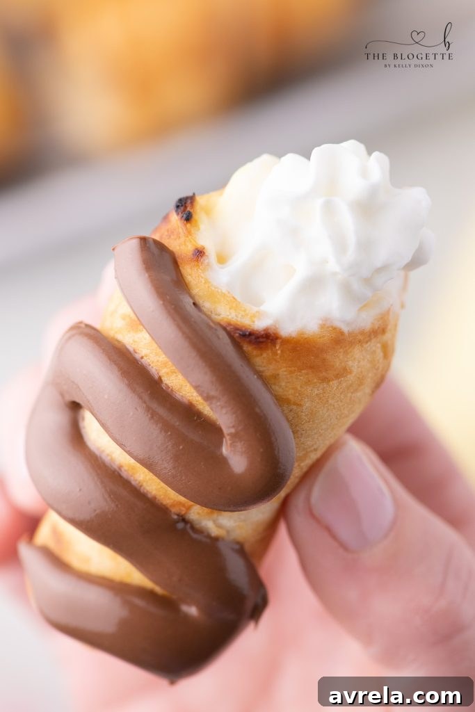 Fireside Eclairs 2 Decadent Campfire Éclairs are the perfect camping recipe and are sure to be the highlight of your summer camping trip!