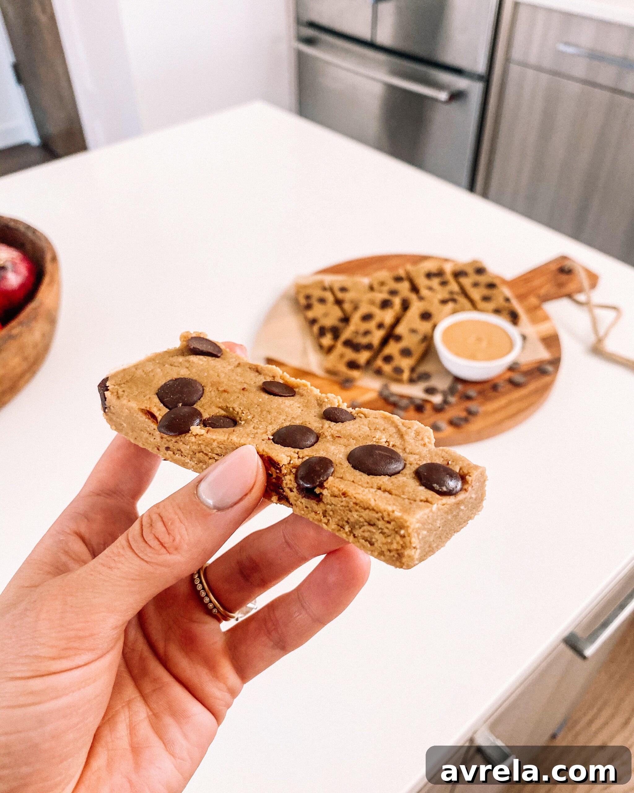 Delicious homemade peanut butter protein bars with chocolate chips, ready to eat.