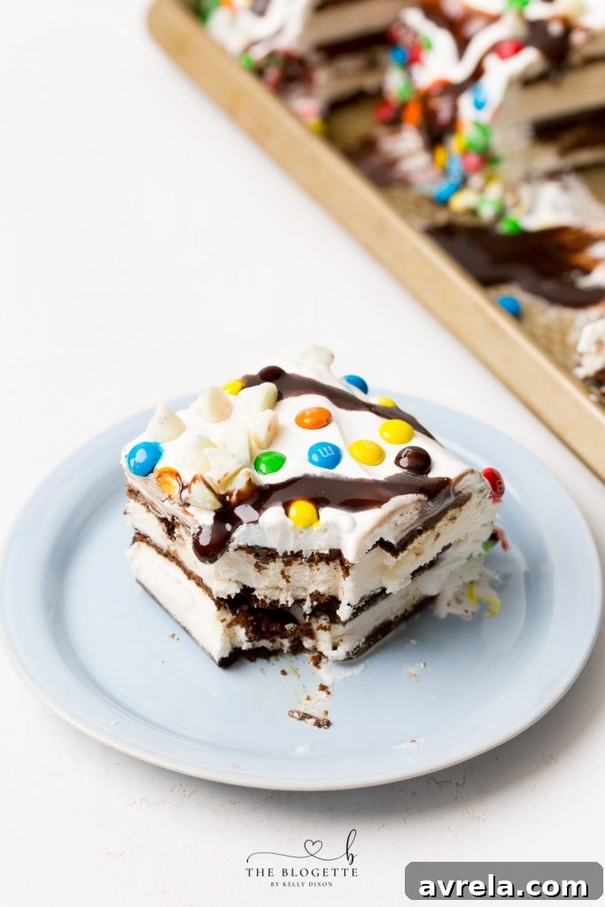 No-Bake Ice Cream Sandwich Stack 7 Close up of a perfect slice of ice cream cake showing layers of ice cream sandwich and whipped cream