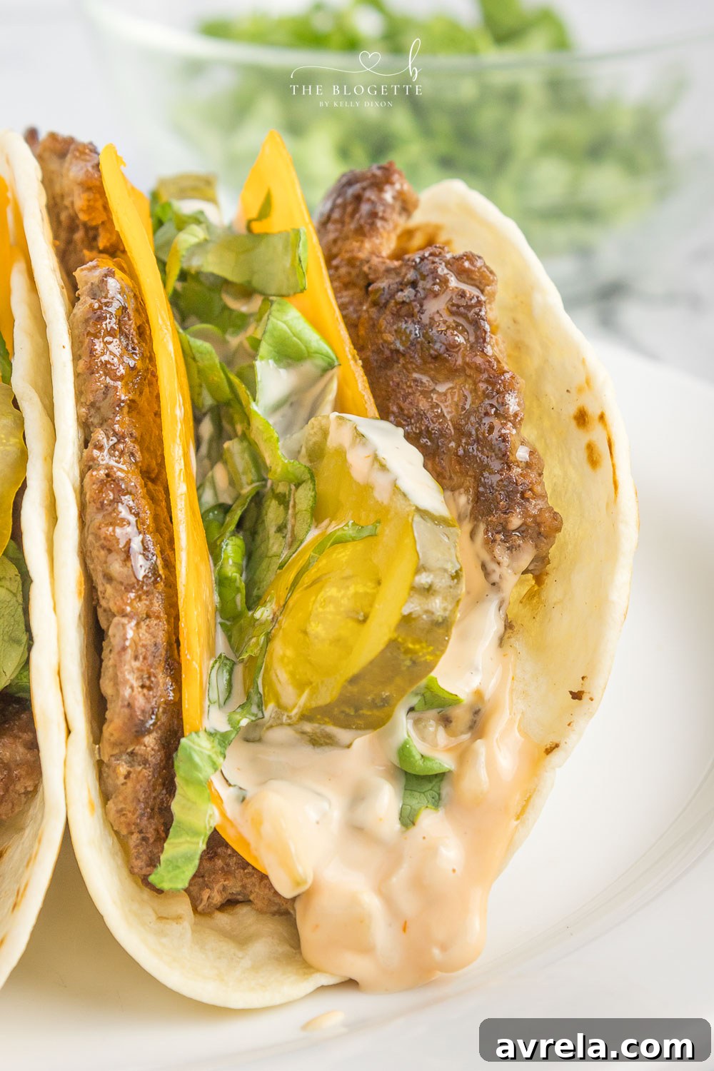 Double-Decker Taco 10 Big Mac Tacos! Juicy beef patty, melted cheddar, topped with an easy-to-make homemade Big Mac sauce! Add Taco Burgers to your menu tonight!