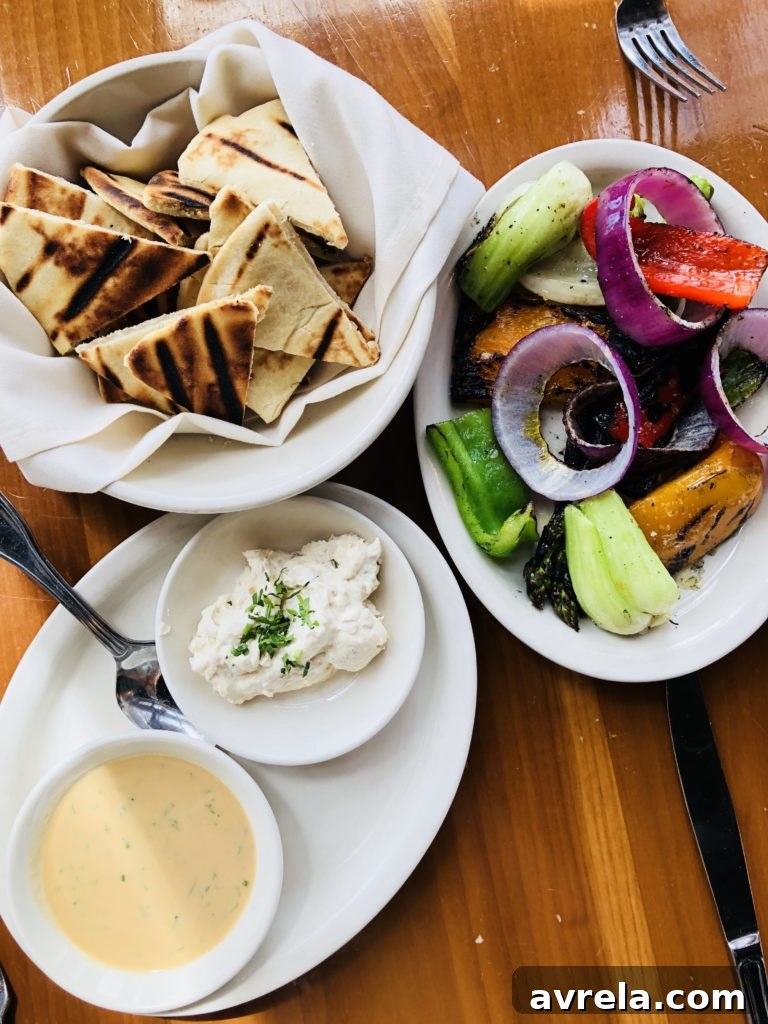 Roasted vegetables, trio of spreads, and fresh pita at Eve restaurant