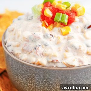 Creamy Fiesta Ranch Dip is an addicting chip dip that everyone looks forward to at parties! Served with your favorite chips.