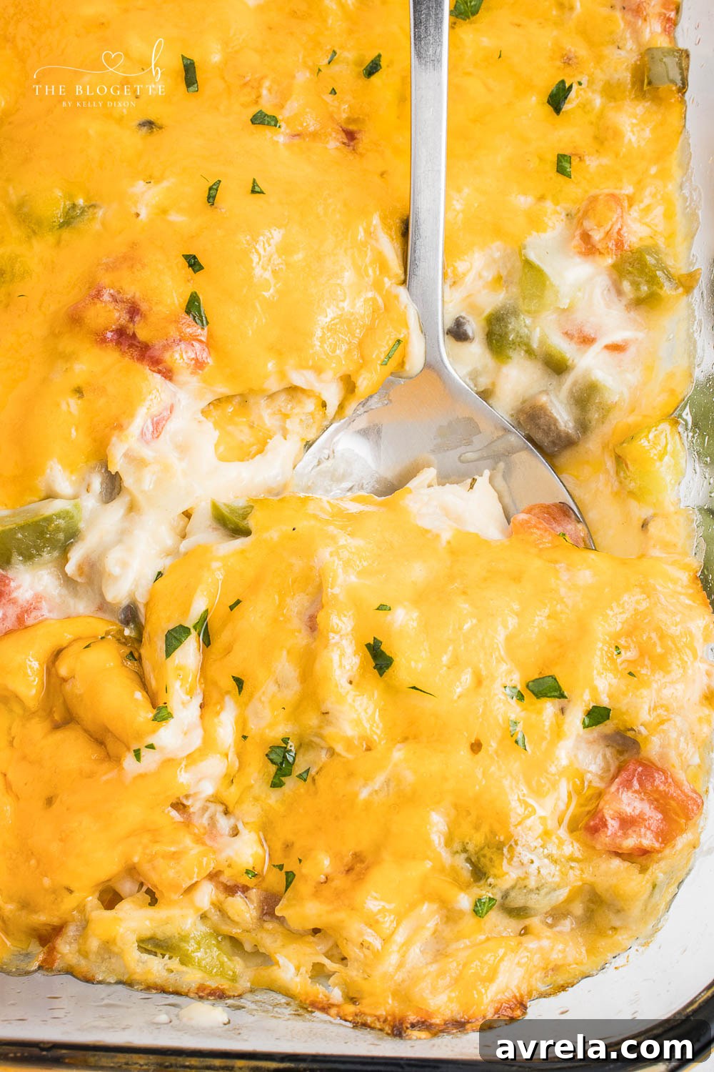 King Ranch Chicken Casserole is a combination of chicken, cheese, veggies, and corn tortillas in a rich and creamy sauce.