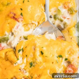 King Ranch Chicken Casserole is a combination of chicken, cheese, veggies, and corn tortillas in a rich and creamy sauce.