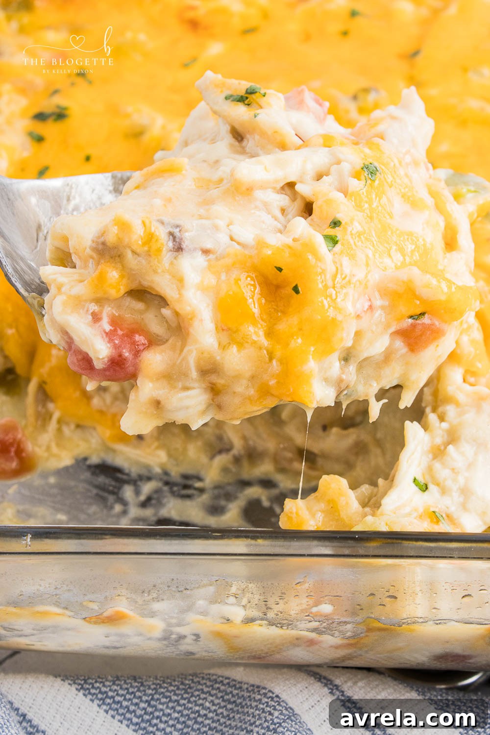 King Ranch Chicken Casserole is a combination of chicken, cheese, veggies, and corn tortillas in a rich and creamy sauce.