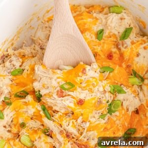 Crock Pot Crack Chicken is a heavenly dish featuring everyone's favorite chicken breasts, cream cheese, ranch seasoning, and bacon!
