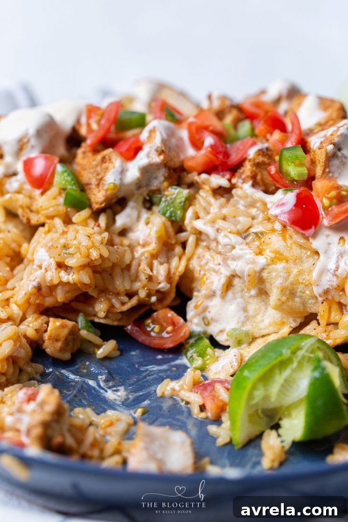 Mexican Fiesta Chicken and Rice 3 Generous serving of Mexican Chicken and Rice with fresh toppings and a creamy cheese sauce