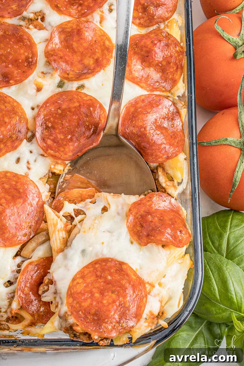 Freshly baked pizza casserole garnished with herbs, ready to be served.