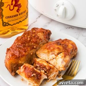 Crock Pot Fireball Chicken - a flavorful slow cooker chicken seasoned with a homemade Fireball-flavored sauce! The whiskey sauce makes the chicken so juicy and delicious.